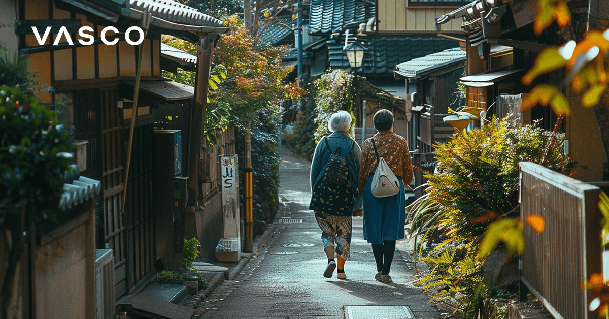 Two elderly women walking by the Japanese street.