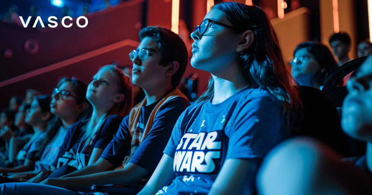 Star Wars fan sitting in the cinema. 