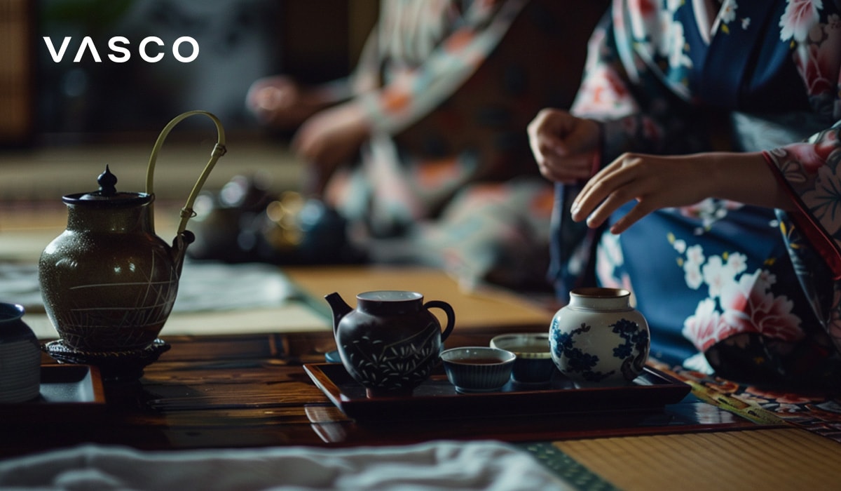 A traditional Japanese tea ceremony, with participants in kimonos preparing tea.