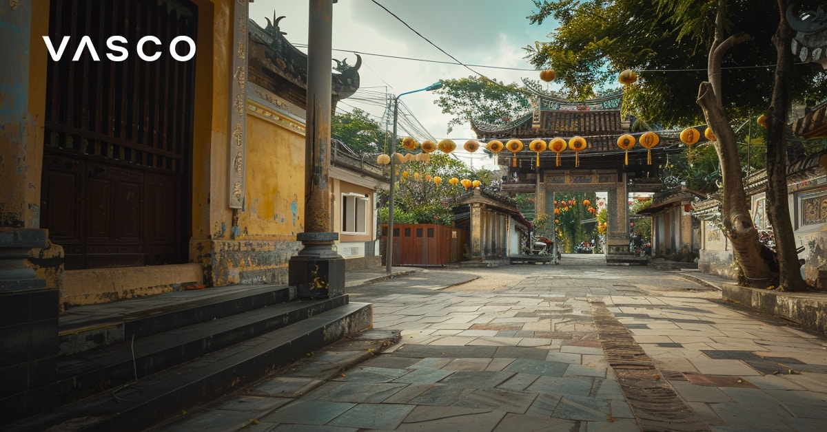 A quiet street adorned with lanterns, illustrating where is a good place to visit in October and the weather in Vietnam.