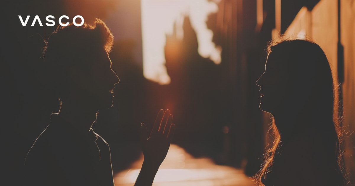 Two people silhouetted against the sunset, focusing on ways to say hi in different languages.