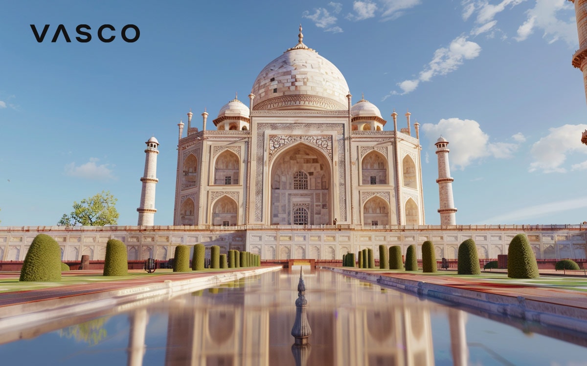 View of the Taj Mahal with a clear blue sky and its reflection in the water.