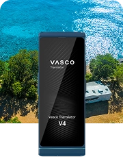 A camper van parked by the coastline with scenic waters in the background, alongside an image of the Vasco Translator V4 in Cobalt Blue.