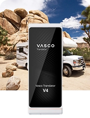 A white camper van with rocky formations visible in the background, alongside an image of the Vasco Translator V4 in Pearl White.